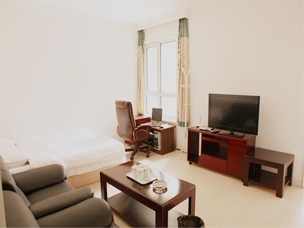 Xinghai Zhilian Apartment Dalian Værelse billede